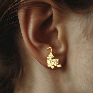 Gold puma earrings Etsy Mexico