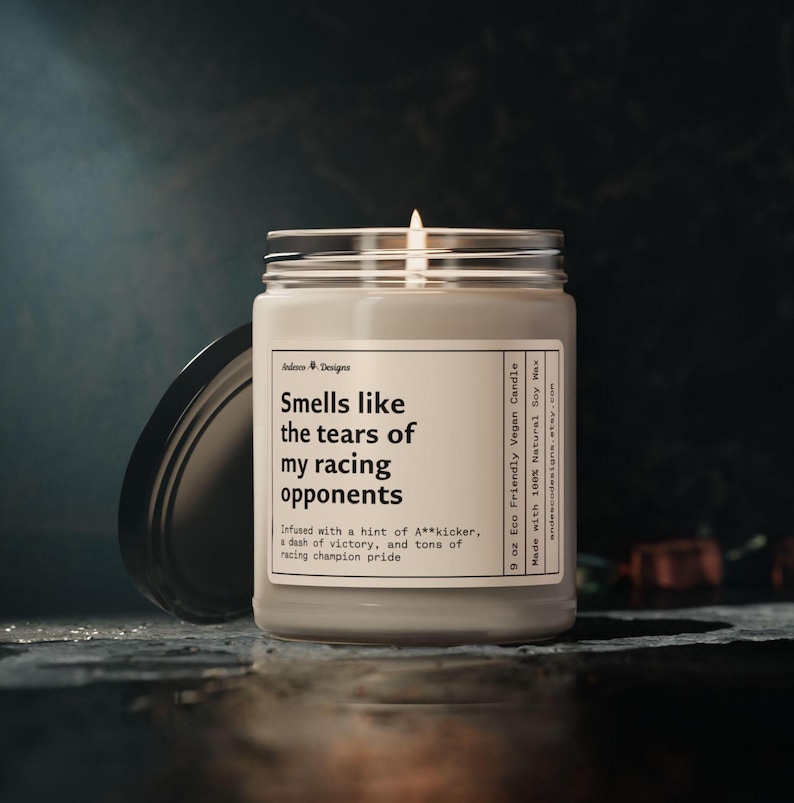 a funny candle that says smells like the tears of my racing opponents - infused with a hint of A**kicker, a dash of victory, and tons of racing champion pride.