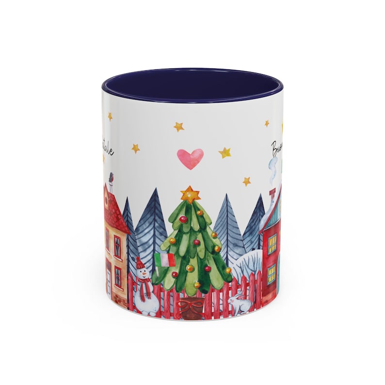 May include: White ceramic mug with a blue rim, featuring a watercolor illustration of a winter scene with a Christmas tree, two houses, a snowman, and two rabbits. The text "Believe" and "Believe" is visible on the mug.