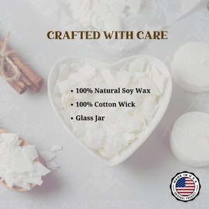 May include: A white heart-shaped bowl filled with white soy wax flakes. The text "CRAFTED WITH CARE" is at the top of the image. The text "100% Natural Soy Wax", "100% Cotton Wick", and "Glass Jar" are listed below the bowl. A red, white, and blue American flag is in a circle with the text "MADE IN USA ORIGINAL PRODUCT" around it.