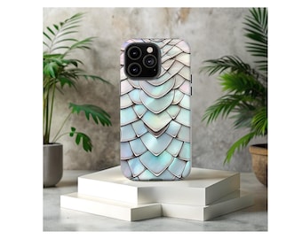 May include: A white iPhone case with an iridescent blue and green scale pattern.
