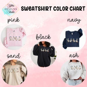 May include: Sweatshirt color chart featuring pink, black, navy, sand, and ash-colored sweatshirts. Each sweatshirt displays an embroidered design of geese wearing hats. The text "Ysha Designs Studio" is at the top left.