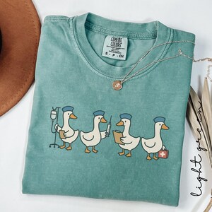 Funny Nurse Comfort Colors Shirt, Sarcastic Registered Nurse Sweatshirt, New Nurse Graduation Gift for RN, Humorous Goose School Nursing Tee