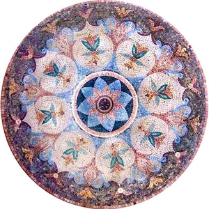 May include: A round mosaic table top with a floral design. The center features a blue flower with a dark purple center. The surrounding circles have a floral pattern with green leaves and yellow accents. The border is a mix of colors including brown, purple, and gold.