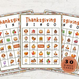 May include: Thirty Thanksgiving bingo cards with images of fall and Thanksgiving themed items like a turkey, pumpkin, cornucopia, and apple pie. The cards are printed on white paper with a brown and orange patterned border.