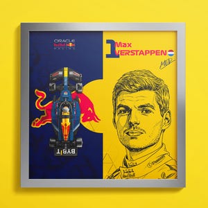May include: Framed artwork featuring a split design. One side displays a Formula 1 race car with the text "BYBIT" and the Oracle Red Bull Racing logo. The other side features a portrait of Max Verstappen with his name and the Dutch flag.