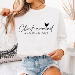 May include: A rustic wooden sign with the text "Welcome to our home" in white lettering. The sign features a distressed finish and a simple, inviting design, perfect for a front porch or entryway.