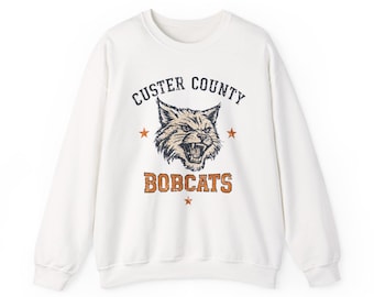 Sudadera de cuello redondo de los Bobcats del condado de Custer / Gráfico de mascota