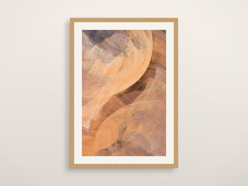 May include: A rectangular wall art print in a light wood frame featuring an abstract composition of swirling, translucent layers in shades of soft peach, warm orange, muted brown, and deep charcoal gray, creating a fluid, layered visual effect.