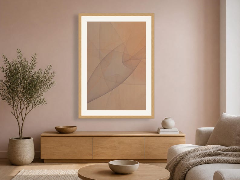 May include: A rectangular wall art piece featuring an abstract design of soft, overlapping translucent curves in shades of beige and tan. The artwork is enclosed in a light-colored wooden frame with a wide white mat border, creating a clean look.