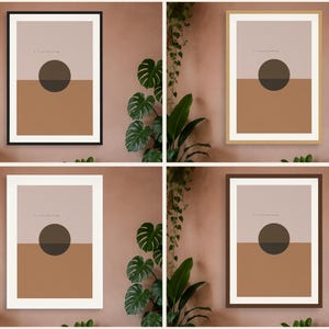 May include: Four framed wall art prints featuring a split-color design with a light beige top half and a terracotta bottom half. A dark brown circle is centered across the horizontal line. The frames are black, light wood, white, and dark brown.