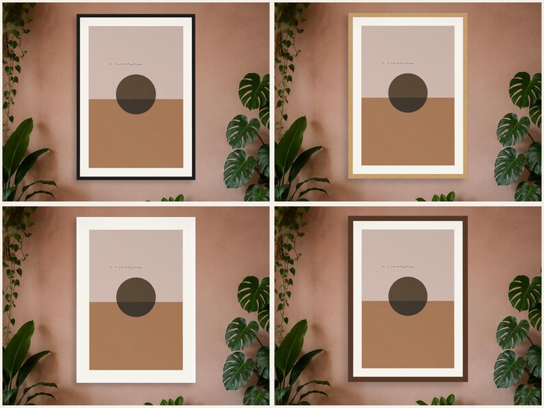 May include: Four framed wall art prints featuring a split-color design with a light beige top half and a terracotta bottom half. A dark brown circle is centered across the horizontal line. The frames are black, light wood, white, and dark brown.