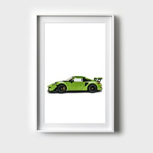 May include: A green model car with black accents and a white interior. The car is in a white frame.