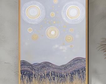 May include: Abstract landscape painting in a wooden frame. The artwork features a light blue sky with gold and white circular designs. Below, a dark blue and purple dotted mountain range sits above golden grass.