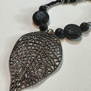 Black Lava Stone Statement Diffuser Necklace with Leaf Pendant