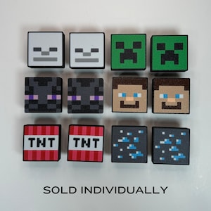 May include: A set of 10 Minecraft character and item themed square tiles. The tiles feature characters like Steve, Creeper, Enderman, and Skeleton, as well as items like TNT and diamonds.