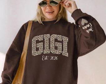 Custom Leopard Gigi Sweatshirt With Kid Name On Sleeve, Personalized Gigi Sweatshirt,Gift For Gigi,Mothers Day Gift,Gigi Est Year Sweatshirt