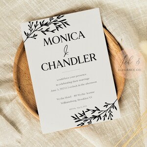 May include: A white wedding invitation with black text and floral illustrations. The invitation reads "Monica & Chandler would love your presence in celebrating their marriage June 3, 2024 15 o'clock in the afternoon Wythe Hotel 80 Wythe Avenue Williamsburg, Brooklyn NY RSVP May 15, 2024".