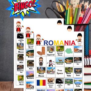Pode incluir: Um cartão de jogo de bingo colorido com a palavra "ROMANIA" e várias imagens de animais, marcos e elementos culturais. A palavra "BINGO!" é exibida em uma bolha de estilo de história em quadrinhos. Lápis, tesouras e uma régua no fundo.