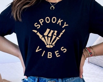Embrace Spooky Vibes with our Skeleton Hand 'Spooky Vibes' T-Shirt - Perfect for Halloween and Beyond! #SpookyVibes #HalloweenFashion, Fall