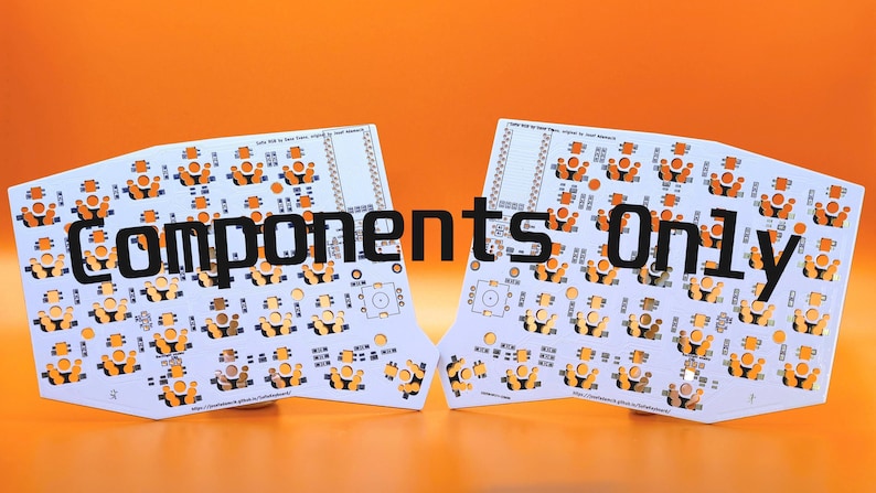 May include: Two white printed circuit boards with orange solder pads and gold-colored contact points. The boards feature the text "Components Only" in large black letters across the center, along with smaller text and various electronic component footprints.