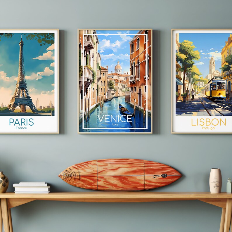 May include: Three vintage travel posters with images of Paris, Venice, and Lisbon. The Paris poster features the Eiffel Tower, the Venice poster shows a canal with a gondola, and the Lisbon poster depicts a street scene with a yellow tram.