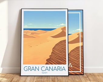 Peut inclure: Deux affiches encadrées représentant un paysage désertique avec des dunes de sable sous un ciel bleu et la mer. Les affiches ont un style minimaliste avec les mots "GRAN CANARIA Spain" en bas.