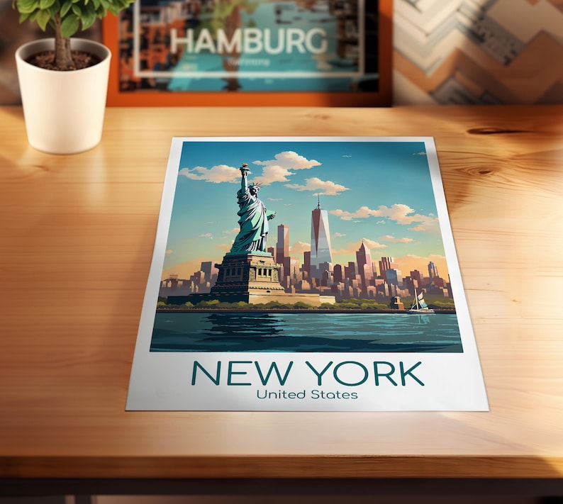 May include: A rectangular art print featuring a stylized illustration of the Statue of Liberty and the New York City skyline under a blue sky with clouds. The text NEW YORK United States is printed in dark teal at the bottom of the white border.