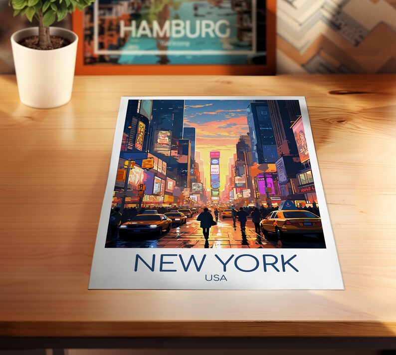 May include: A rectangular art print featuring a vibrant illustration of a New York City street scene at sunset, with yellow taxis, pedestrians, and glowing billboards. The text NEW YORK USA is printed in bold blue capital letters at the bottom.