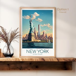May include: A framed wall art print featuring a stylized illustration of the Statue of Liberty and the New York City skyline under a blue sky with clouds. The text reads NEW YORK United States. The print is displayed in a light wood frame.