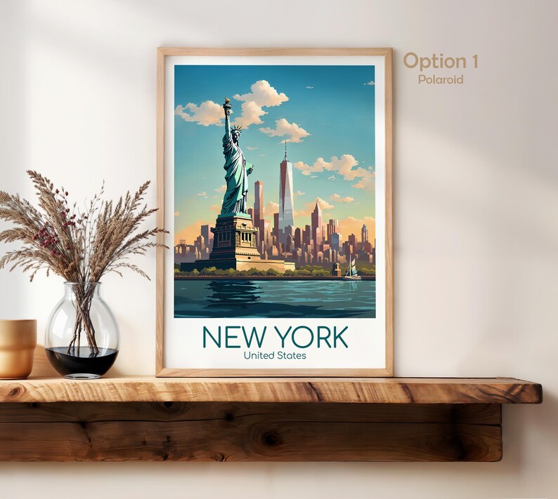 May include: A framed wall art print featuring a stylized illustration of the Statue of Liberty and the New York City skyline under a blue sky with clouds. The text reads NEW YORK United States. The print is displayed in a light wood frame.