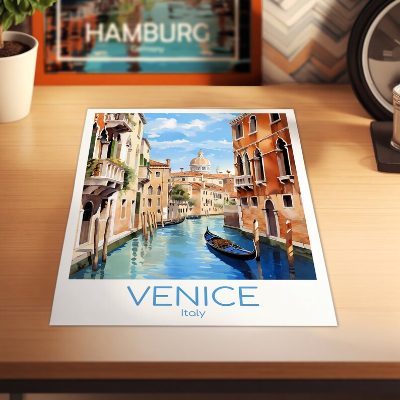 May include: A vintage travel poster featuring a colorful illustration of a canal in Venice, Italy. The poster has the text "VENICE" and "Italy" in blue lettering.
