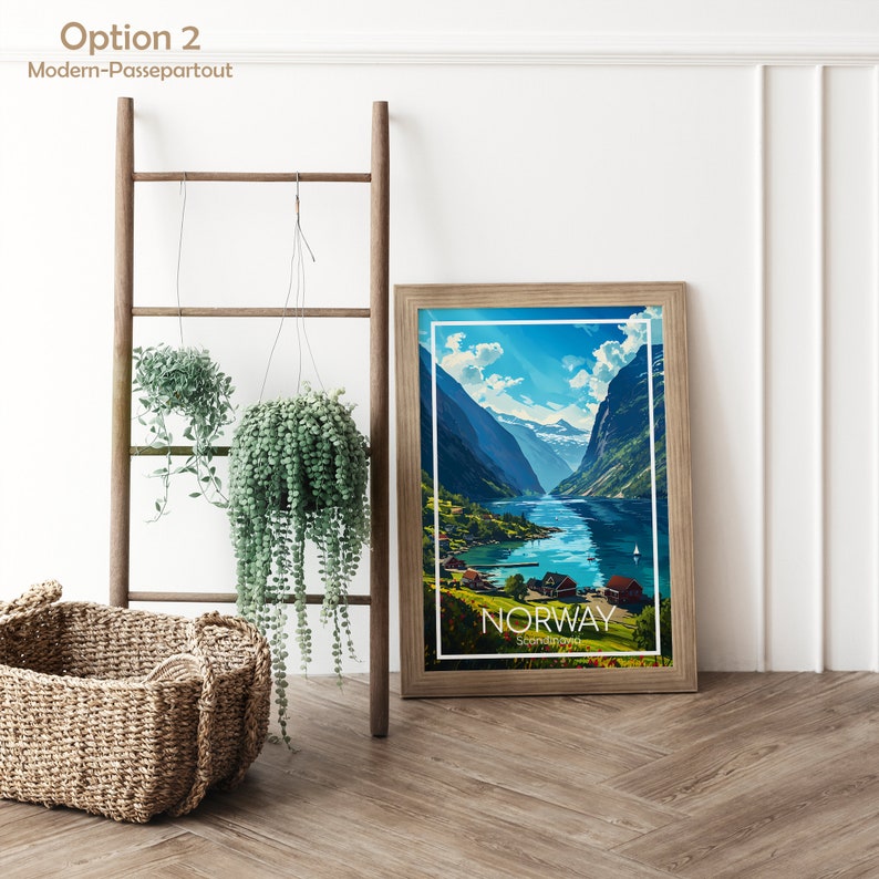 May include: A framed print of a scenic landscape with a fjord in Norway. The print has a white border with the word "NORWAY" and "Scandinavia" in black text.