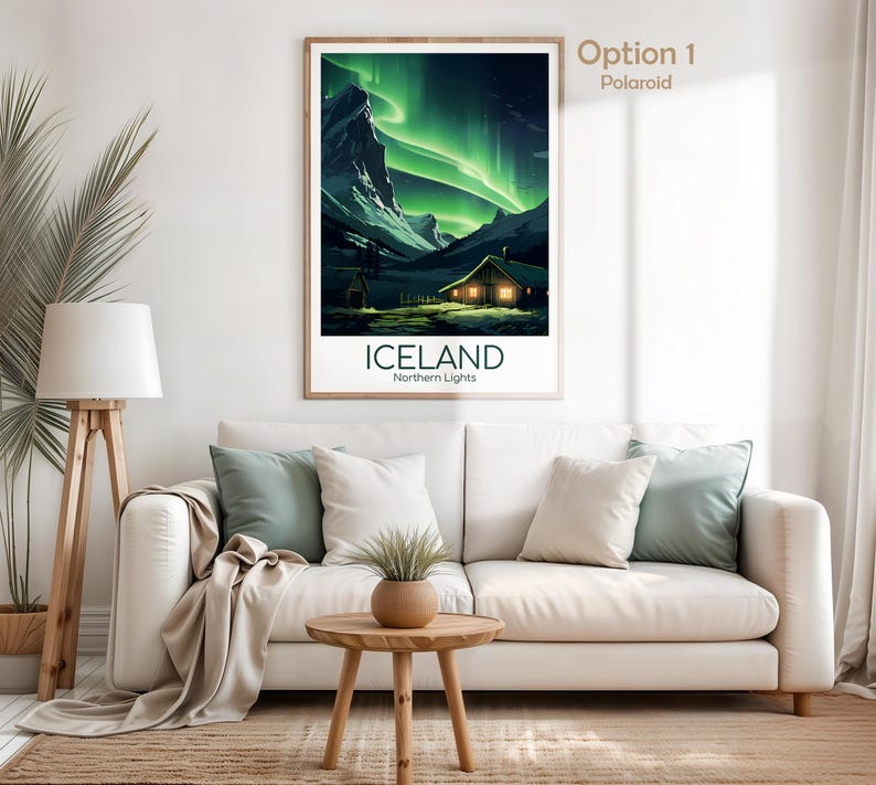 May include: A framed poster featuring a landscape of Iceland's Northern Lights. The artwork depicts a cabin with lit windows under a vibrant green aurora borealis. The word "ICELAND" is printed below the image.