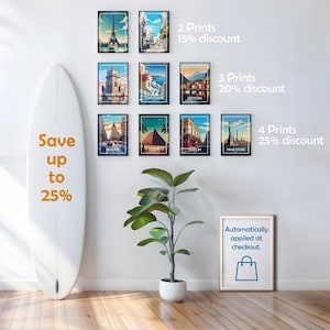 May include: Nine framed travel art prints featuring iconic landmarks like the Eiffel Tower and the pyramids. A white surfboard with "Save up to 25%" text leans against the wall. A framed sign reads "Automatically applied at checkout."