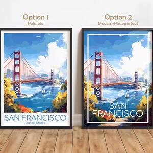 May include: Two framed art prints featuring the Golden Gate Bridge in San Francisco. The artwork depicts the bridge in a colorful, stylized illustration with a blue sky and water. The text "SAN FRANCISCO United States" is at the bottom.