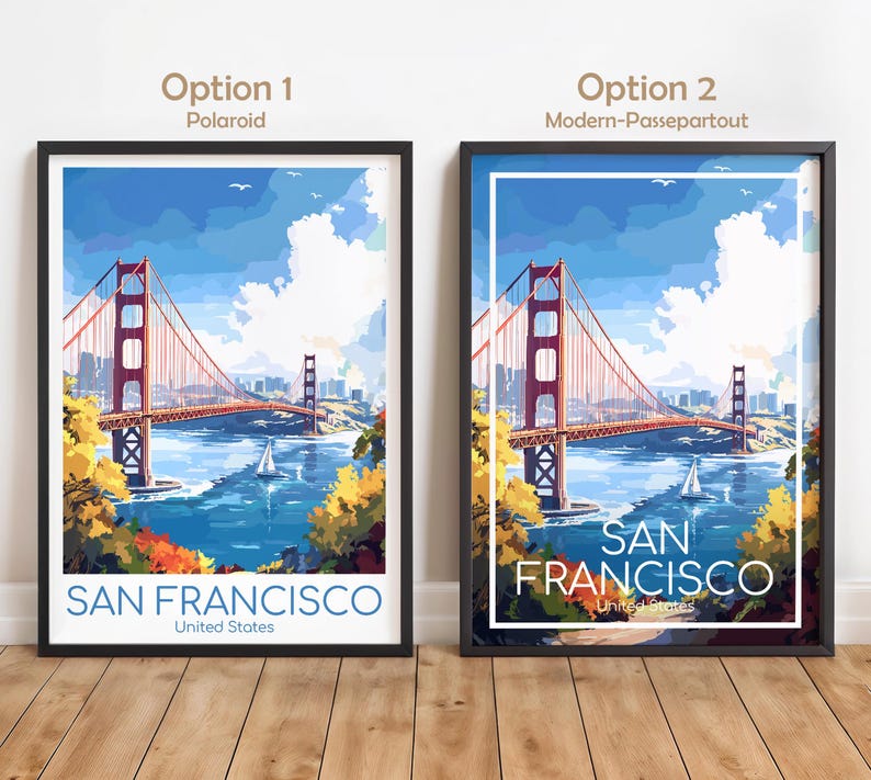 May include: Two framed art prints featuring the Golden Gate Bridge in San Francisco. The artwork depicts the bridge in a colorful, stylized illustration with a blue sky and water. The text "SAN FRANCISCO United States" is at the bottom.