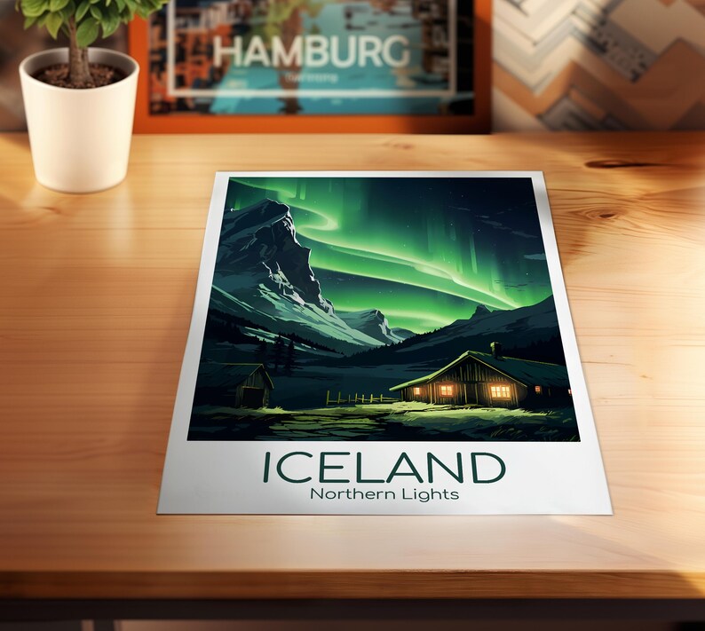 May include: A print featuring a landscape of Iceland under the Northern Lights. The image shows a cabin with lit windows, mountains, and green and white aurora borealis. The word "ICELAND" and "Northern Lights" are printed at the bottom.