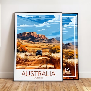 May include: Two framed art prints showcasing an Australian Outback scene with a vehicle on a dirt track. The prints use a vivid colour scheme of blues, oranges, and browns, with the word "AUSTRALIA" at the bottom.