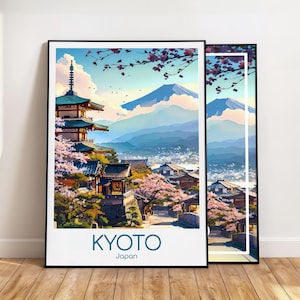 以下が含まれることがあります： 2つの額入りアートプリントは、日本の京都の美しい景色を描いています。アートワークは、青い空の下に、塔、桜、山脈を描いています。「KYOTO」と「Japan」の文字がプリントの下部にあります。