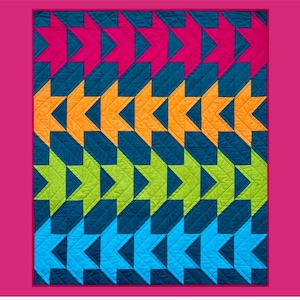 May include: A colorful quilt with a repeating star pattern in shades of pink, orange, green, and blue on a dark teal background. The quilt has a diamond pattern and the word "Viroqua" is at the top. The quilt is made by Rachelle for Villa Rosa Designs.