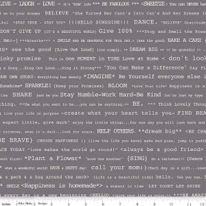 Op de afbeelding: Grijze stof met witte tekst met inspirerende zinnen als "Leef", "Lach" en "Liefde". Het ontwerp bevat motiverende citaten en positieve affirmaties, wat een vrolijke en opbeurende esthetiek creëert.