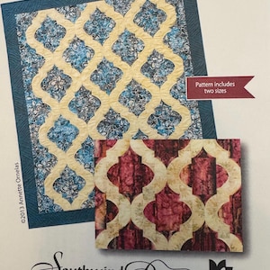 May include: A quilt pattern titled "Moroccan Tiles" featuring a design with cream-colored quatrefoil shapes on a blue and floral background. The pattern includes two sizes. The image also shows a smaller sample with a red and cream quatrefoil pattern.