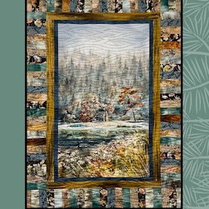 May include: A quilted wall hanging depicting a landscape scene with a cabin near a lake and trees. The quilt has a decorative border and the text "On Key" at the top. The words "Sugar Pine Quilt Designs for Villa Rosa Designs" are at the bottom.