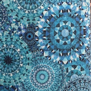 Jewelscape teal and blue Mandela fabric. Elegant Bohemian look. Sold by Quarter Yard
