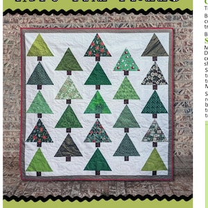 May include: A handmade quilt featuring a repeating pattern of green Christmas trees on a white background. The trees vary in shades of green and patterns. The quilt is bordered with a red trim and the text "INTO THE TREES" is at the top.