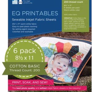 May include: EQ Printables sewable inkjet fabric sheets in a 6-pack of 21.6 x 27.9 cm warm-white cotton fabric. The packaging features a colourful quilt with a baby photo, text including Cotton Basic 200-thread count, and Print, Soak, and Sew.