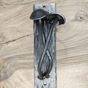 Skåphandtag i svamp-stil