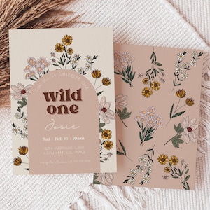 May include: A pink and cream floral patterned invitation card with the text "You're Invited to Celebrate One Wild One Josie Sat Feb 18 10am 234 Wildflower Lane Lafayette, CA 94549"