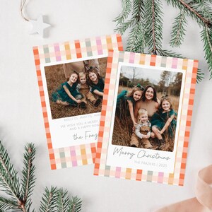 May include: Two Christmas cards with family photos. The cards have a colorful plaid border in orange, pink, and green. One card says "Merry Christmas" and the other says "We wish you a Merry and a Happy New Year."
